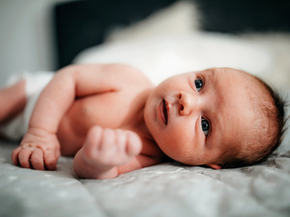 Baby on its side.