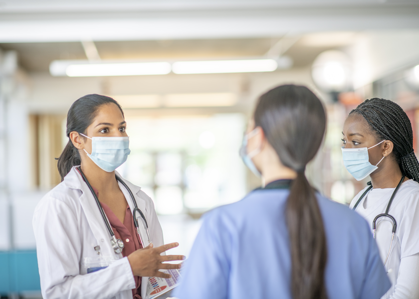 Doctors in the hallway talking