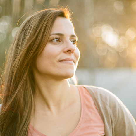 Middle age woman portrait at sunset