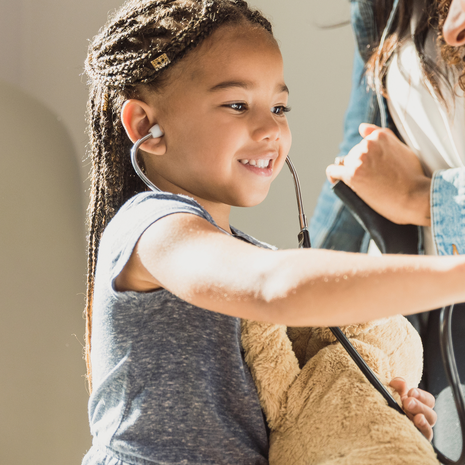Young girl with a stethoscope