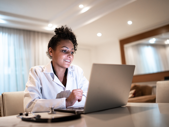 Provider on a laptop for a virtual appointment