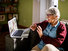 woman talks to a provider on a laptop