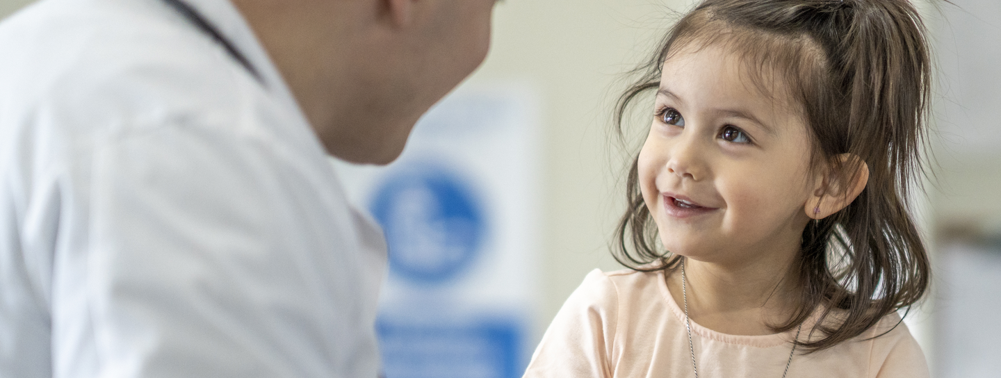 Young patient smiling at doctor