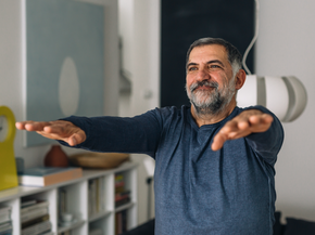 man with outstretched arms