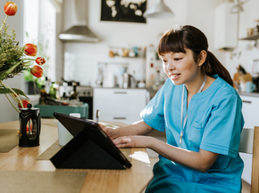 Provider looks up information on laptop.