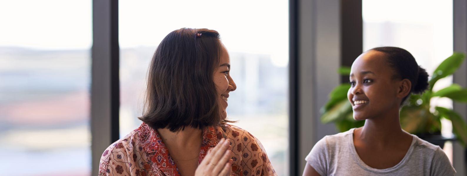Young women having a discussion.