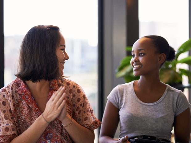 Young women having a discussion.