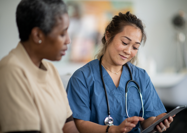 Provider smiles while sharing results with patient.