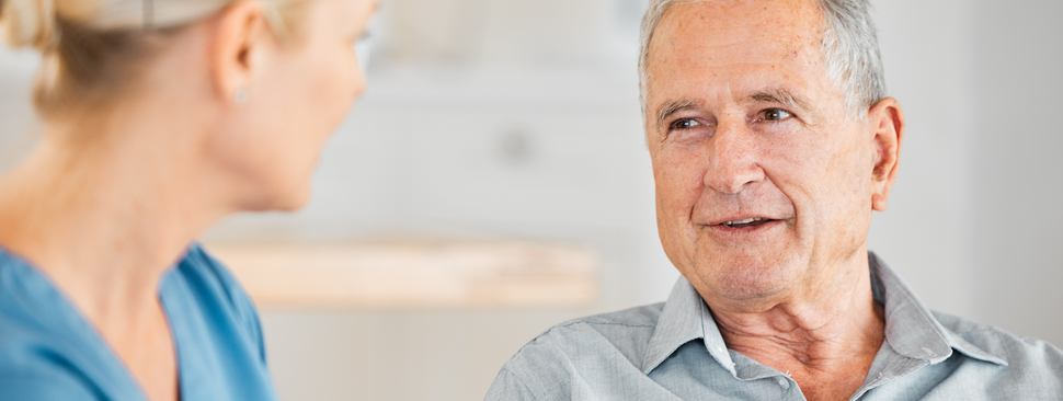 Senior man with nurse