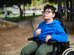 A young boy in a wheelchair