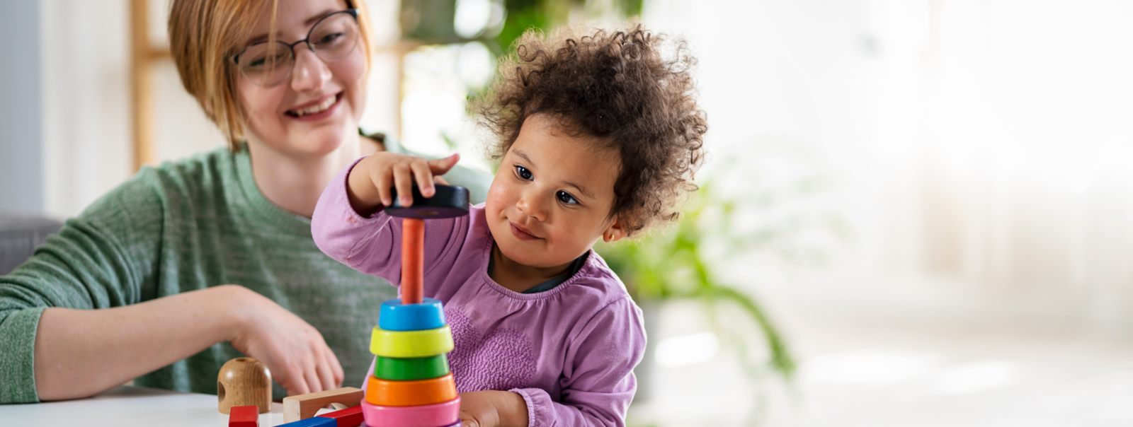 Babysitter watching child.