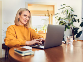 Mature woman working from home on a laptop