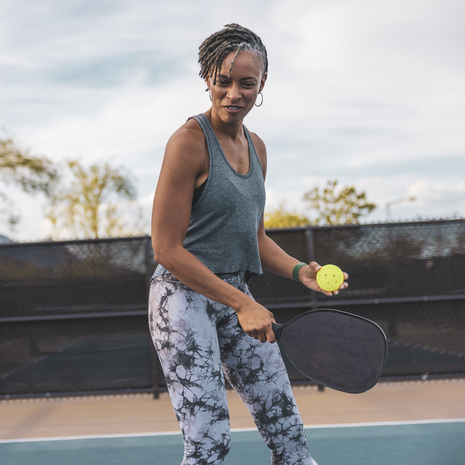 woman playing pickleball