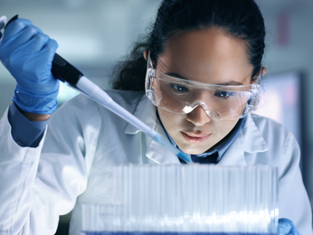 Research, experiment and medical trial being done by a scientist in a lab.