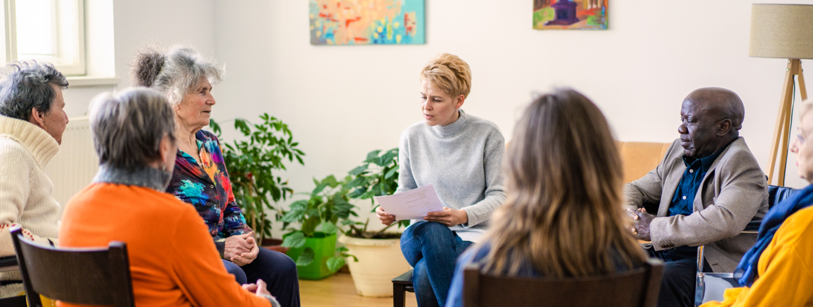 A support group sitting in a circle.
