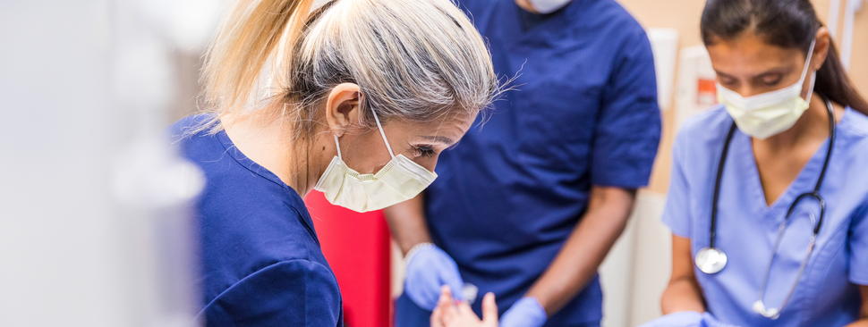 student with pharmacist in pharmacy studies