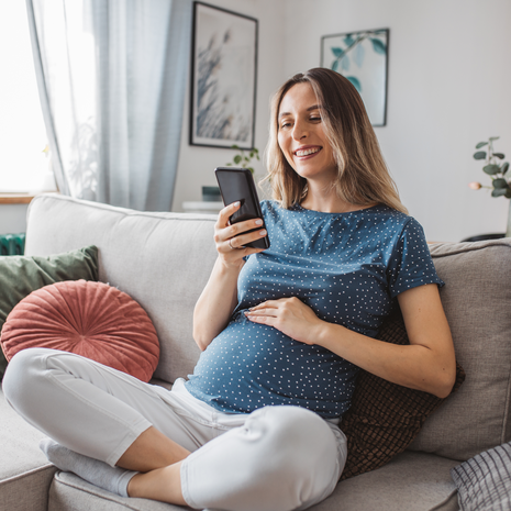 pregnant woman on a virtual video phone call