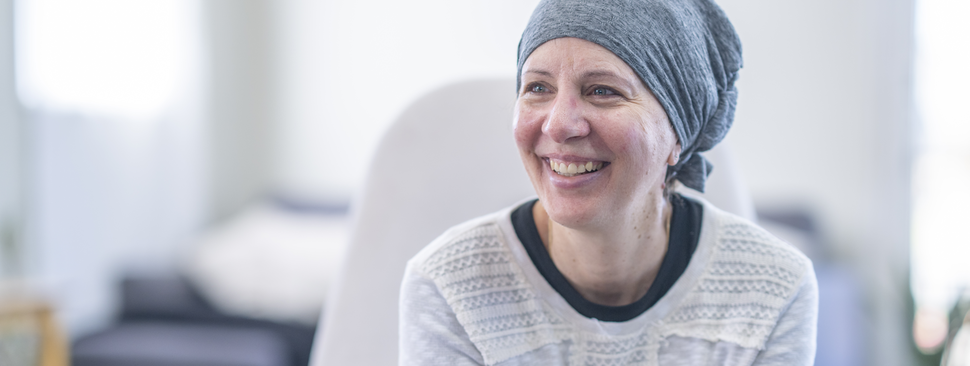 A happy woman in a headscarf
