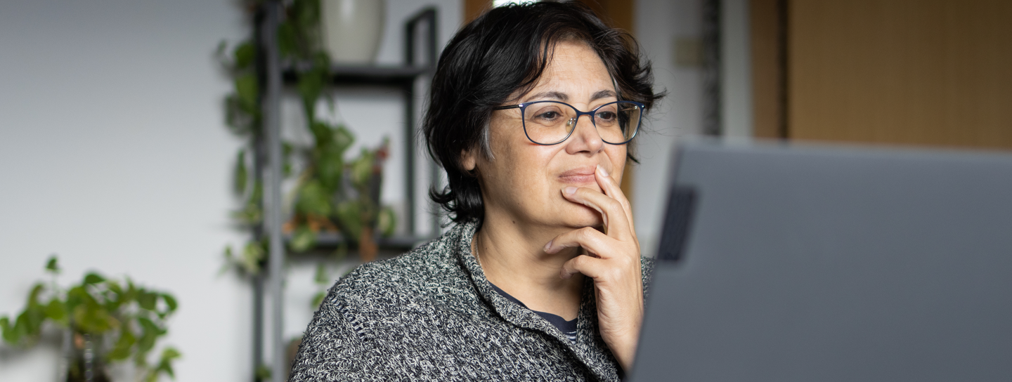 Mature woman on a laptop at home.