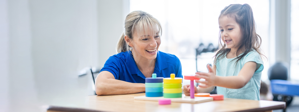 Speech therapist with a young patient.