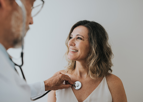 Doctor checks heart rate