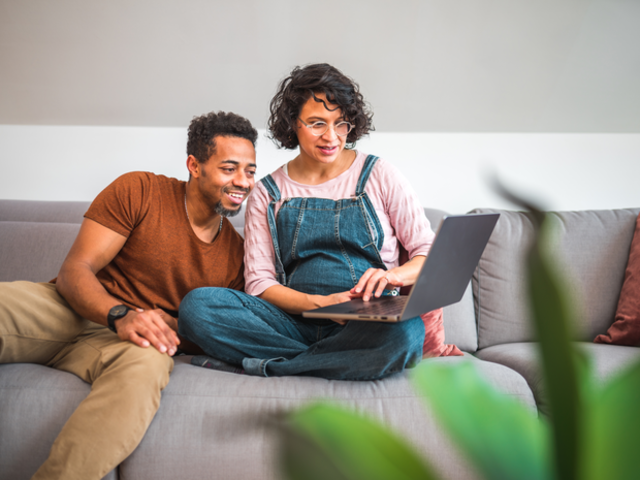 Couple attending online class.