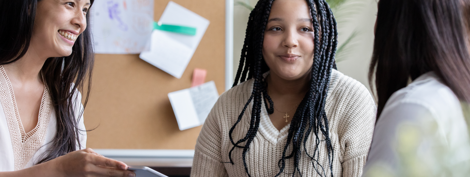 Teenager speaks to health care professionals.