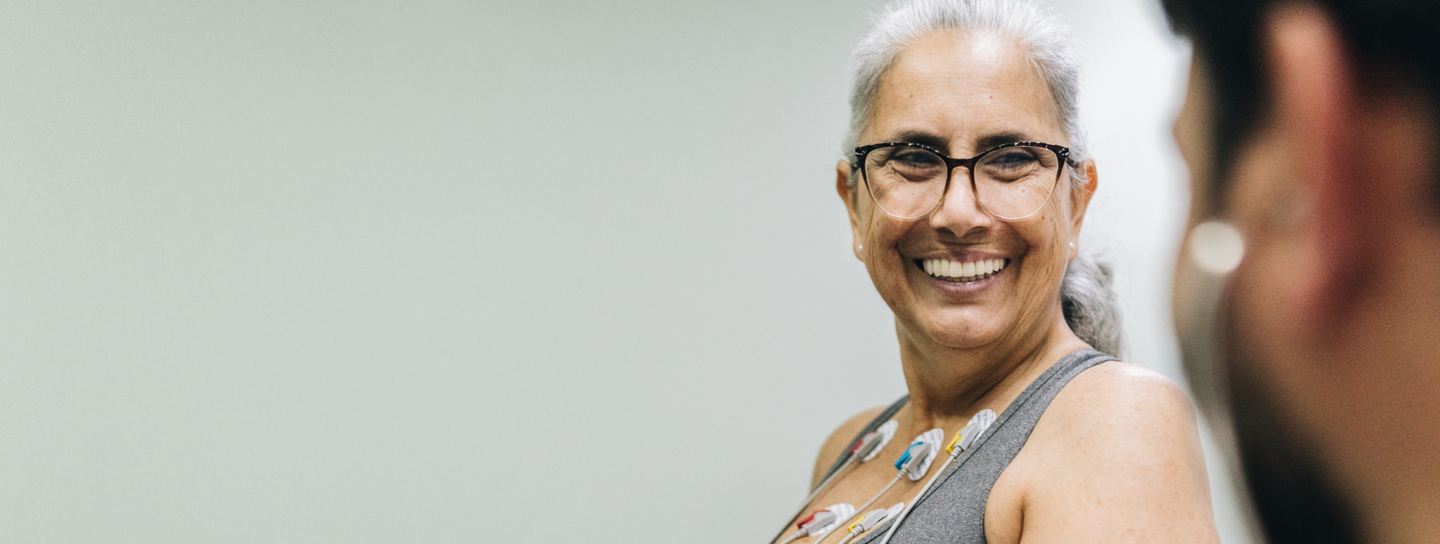 Mature woman undergoing cardiac stress test