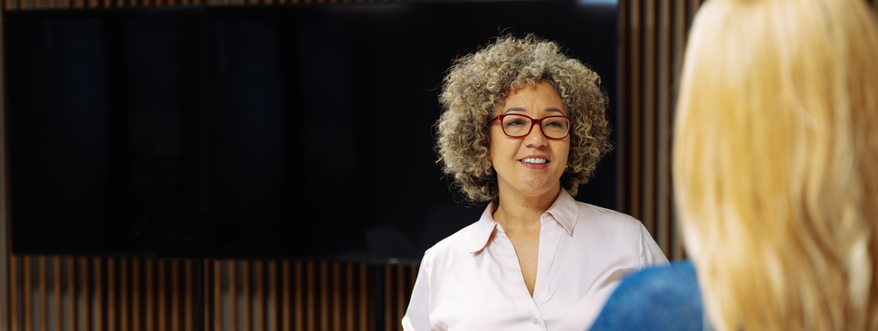 Two people in a discussion