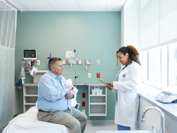 Man talking with his physician
