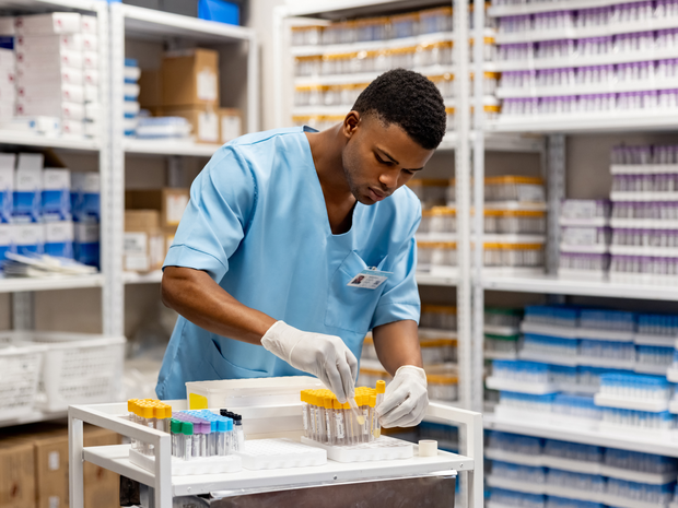 Nurse working at the laboratory organizing test tubes