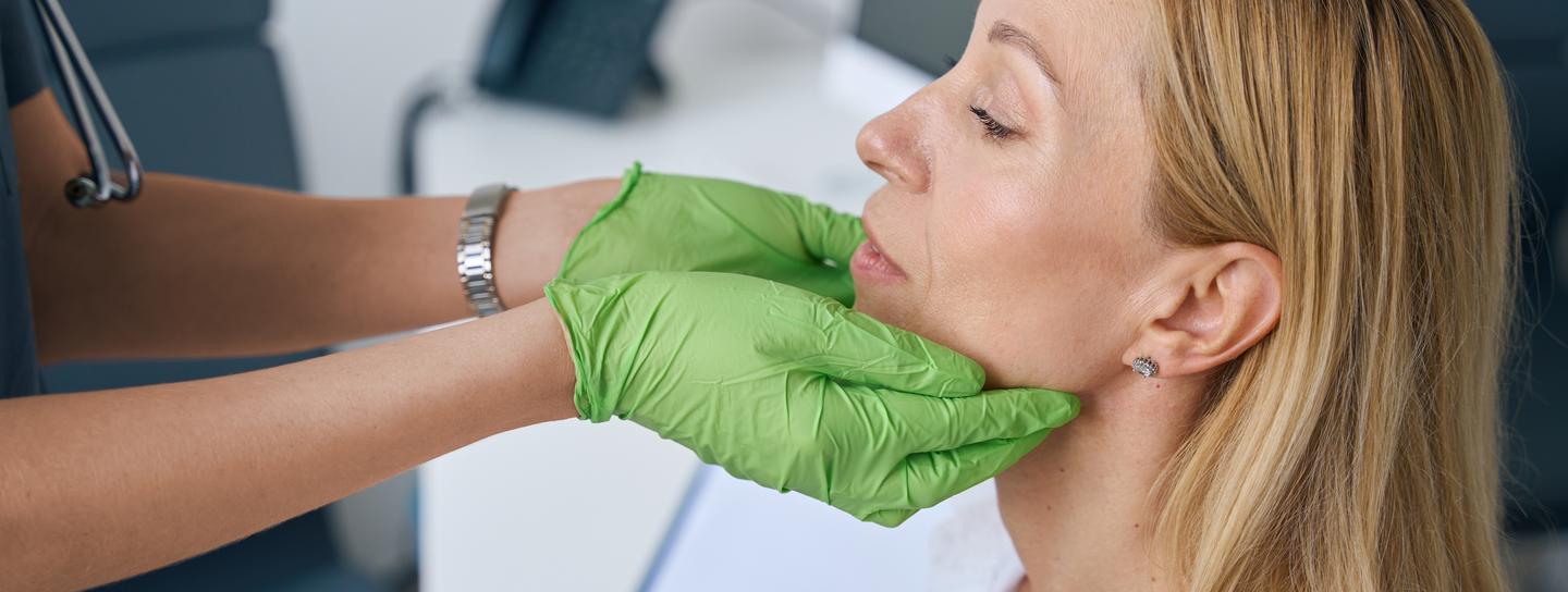 Patient has her jaw examined