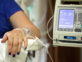 A person with an IV in their arm