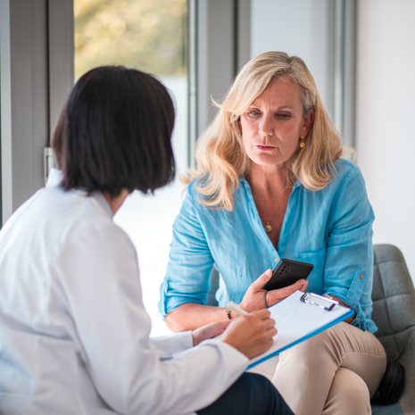 Woman listens to provider