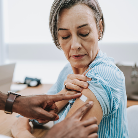 Woman receiving a flu shot