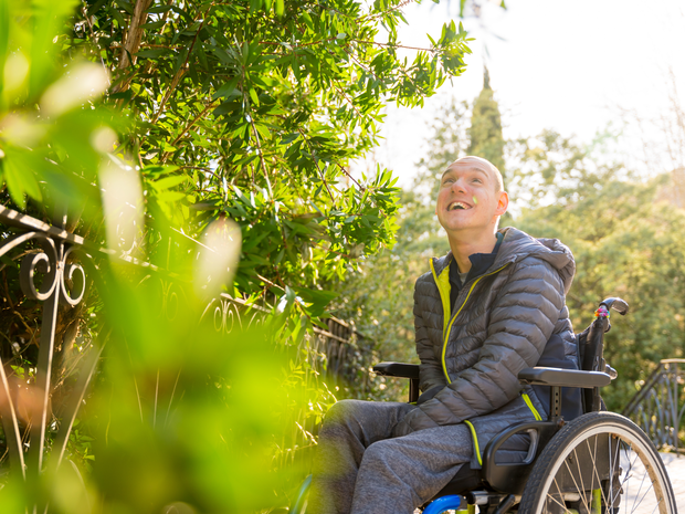 Man in wheelchair in park