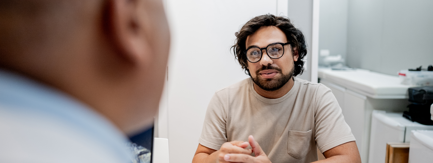 Man speaking with his doctor
