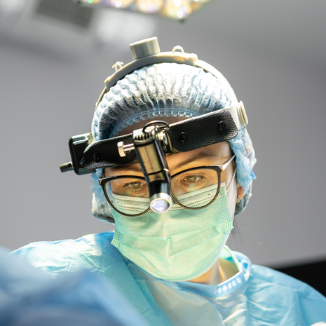 surgeon performing an operation