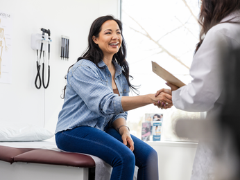 Woman meeting her doctor.