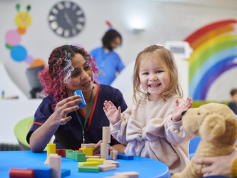 Young girl plays in therapy