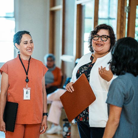 Doctor speaks with colleagues
