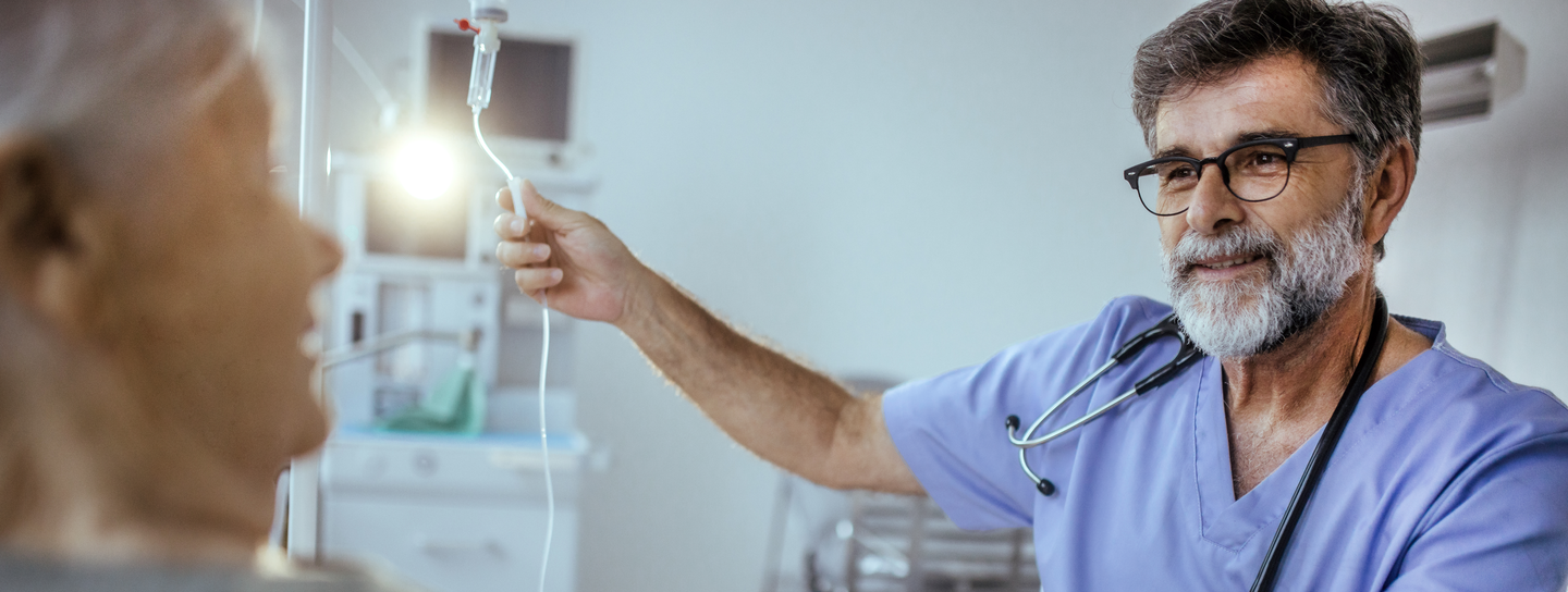 Male doctor with female patient