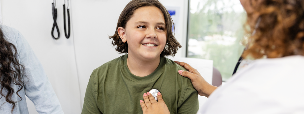 A child being examined by doctor 