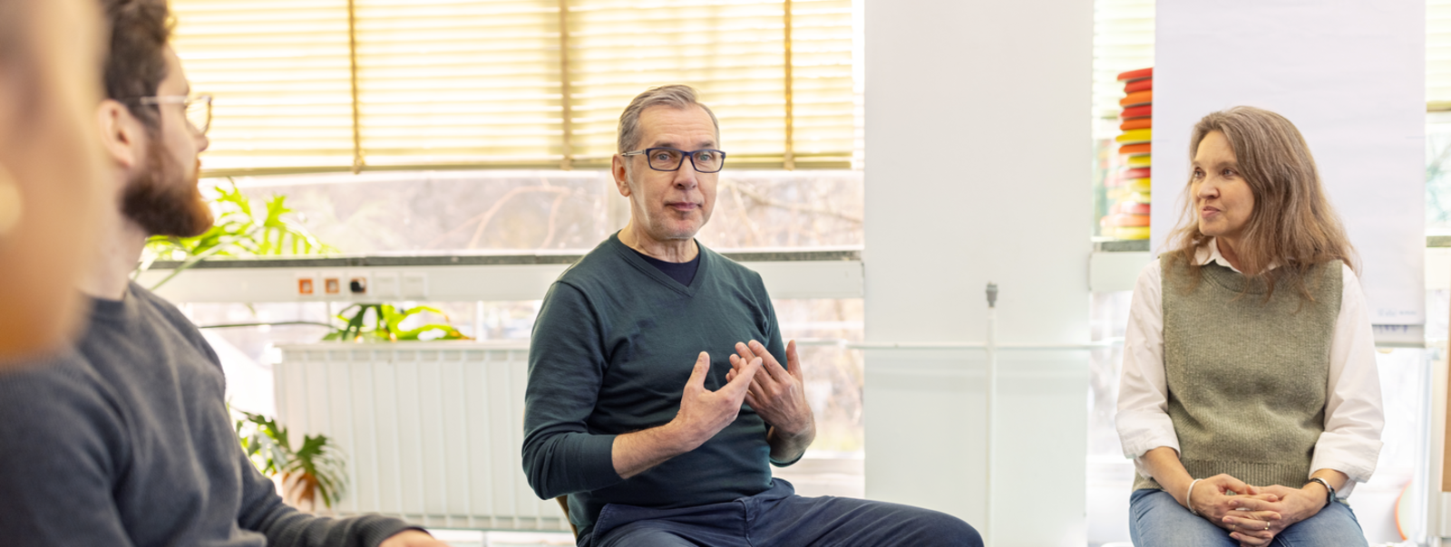 A supportive group listens to each other.