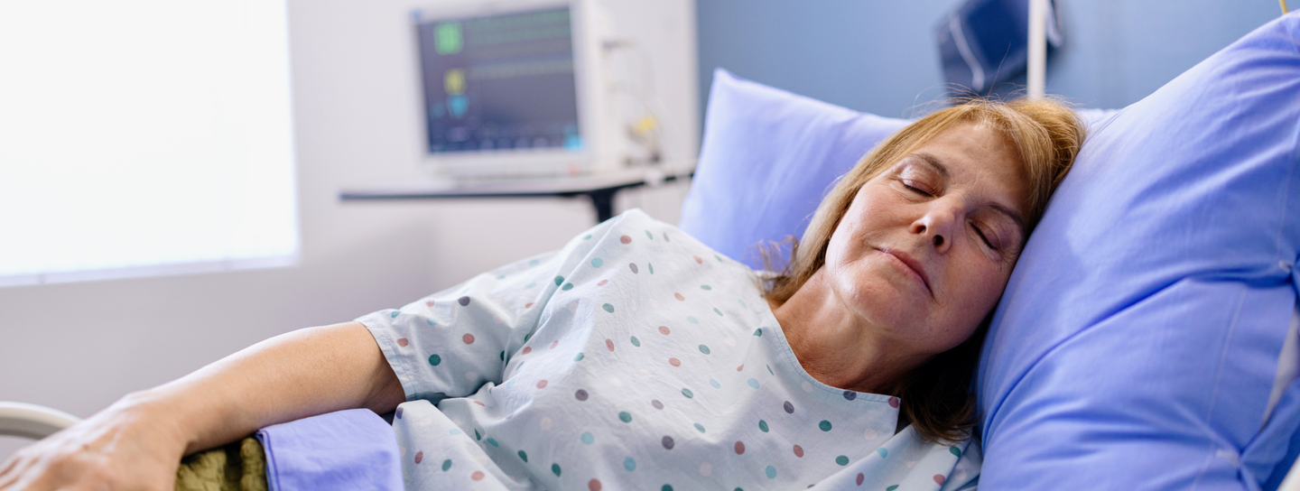 Woman sleeping in the hospital bed 