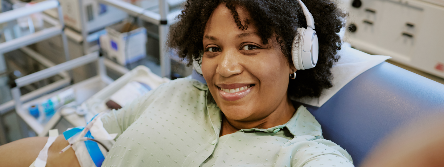 A woman with headphones on 