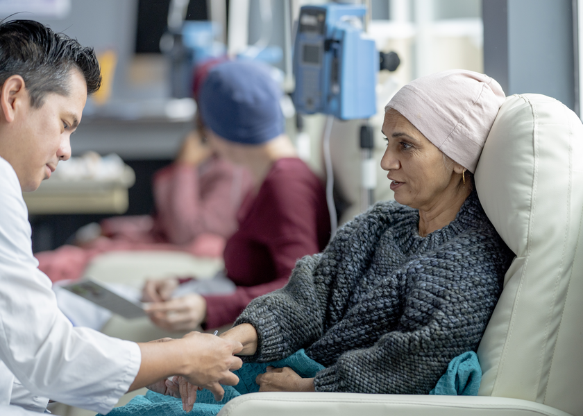 Woman getting chemotherapy treatment.