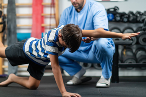 Child works on leg and arm strength
