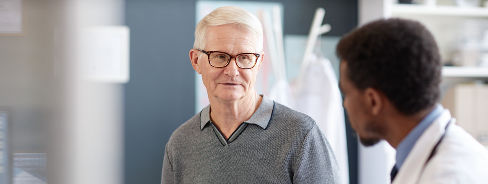 Senior man talking with his doctor