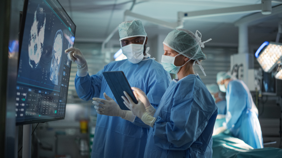 Surgeon works in operating room.